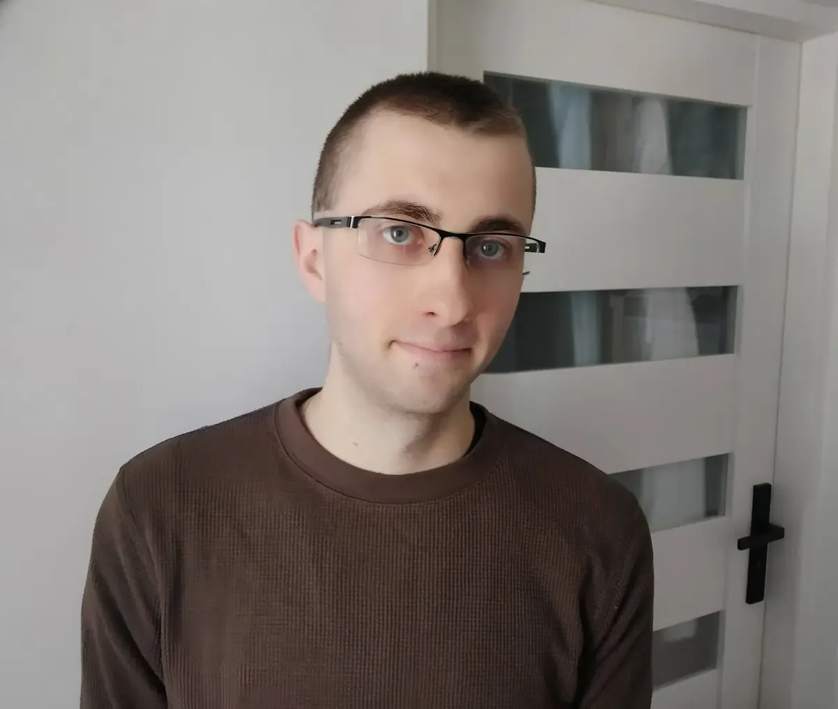 Zdjęcie Łukasza Miłoś, inż. IT